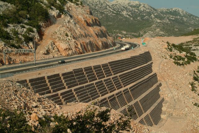 Reinforced earth with gabions supporting a multilane roadway, Sveti Rok, Croatia